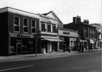 140 High Street, opposite St John's Road, Tesco, Granada, Stanwood Radio and Celdor Fashion in 1975.