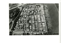 Black and white aerial photograph of caravan site