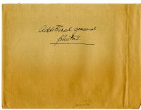 Brown envelop containing black and white photographs