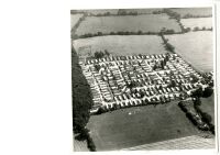 Black and white aerial photograph of mobile home settlement 